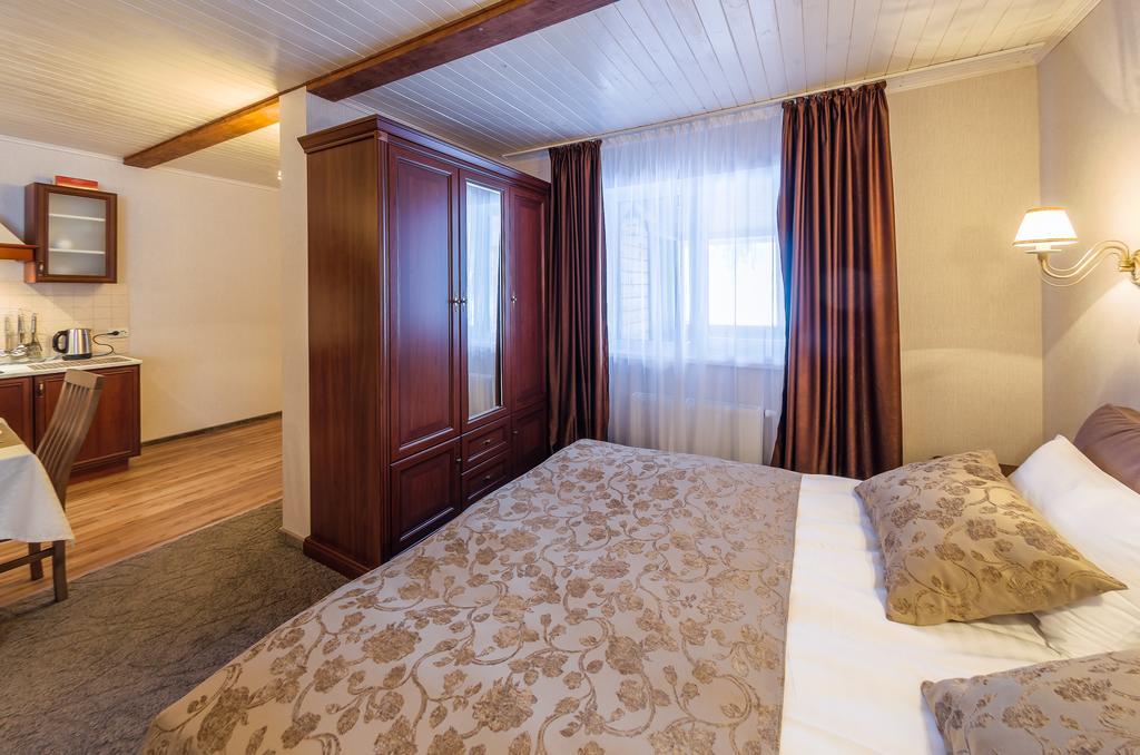 Апарт-Отель 5 Каминов Yasinya Quarto foto